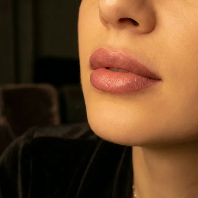 Professional lip tattoo permanent makeup showing natural-looking lip color in Dubai